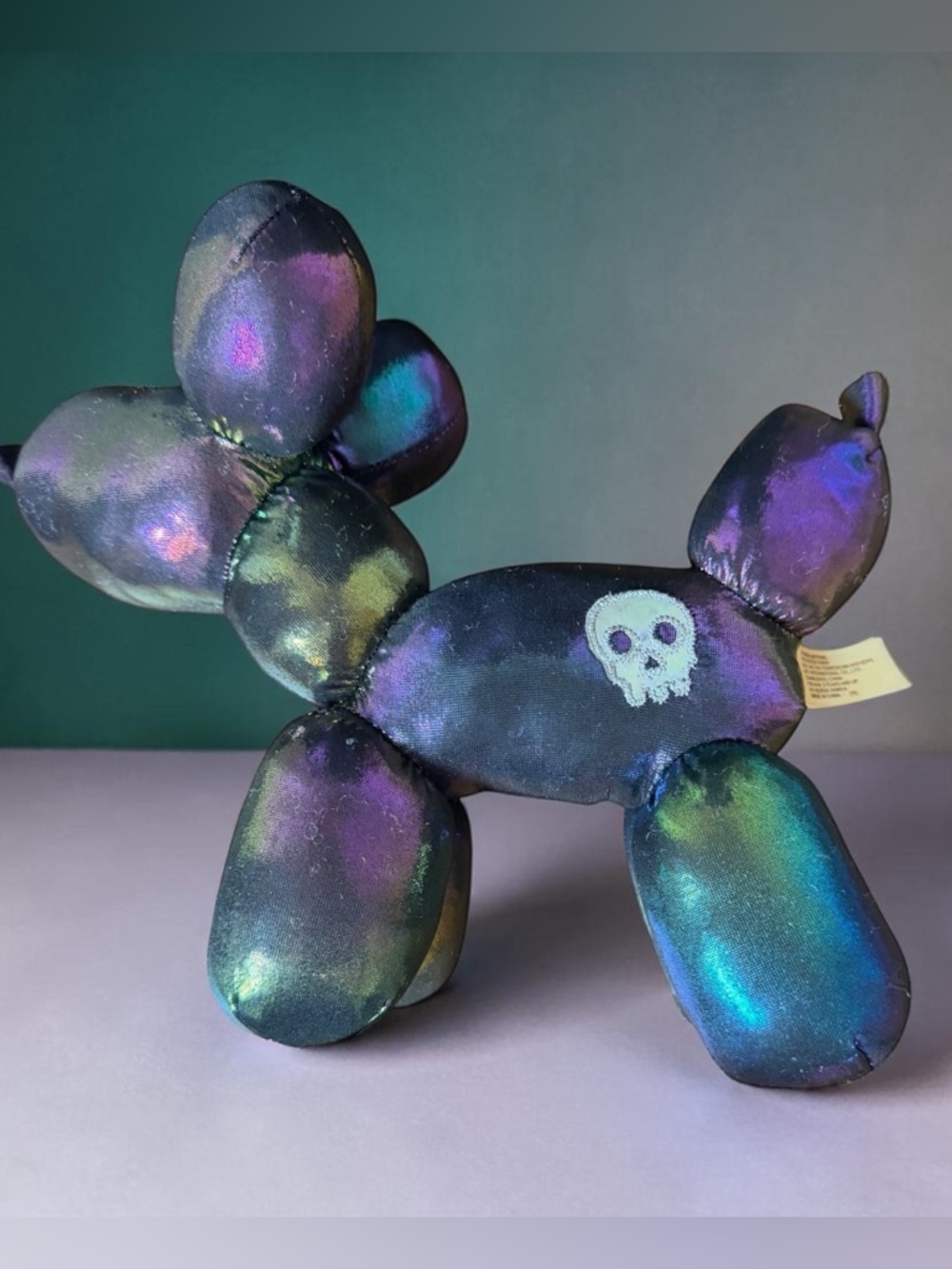 Iridescent Balloon Dog Plush with Skull Accent